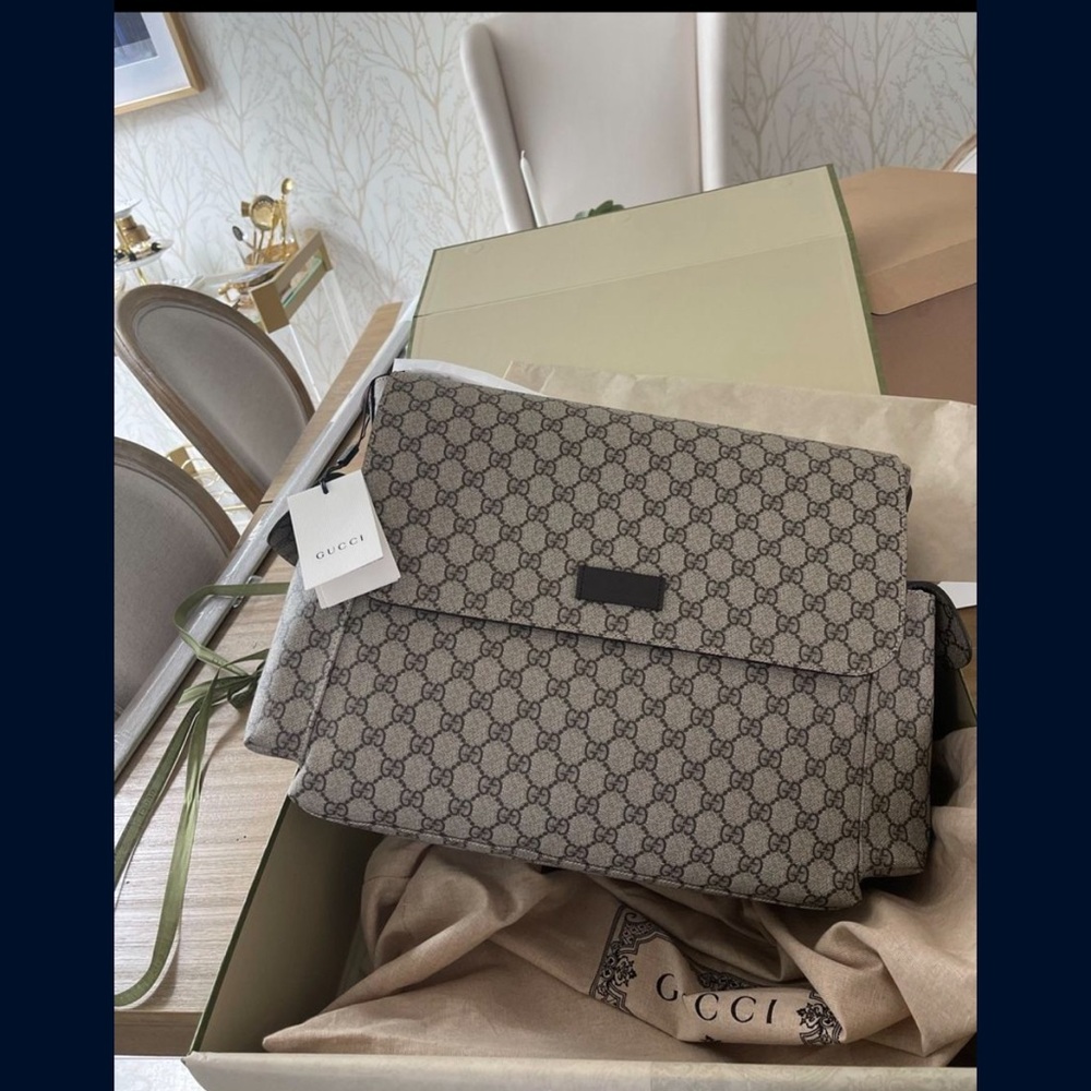 Gucci diaper bag literally used few time I prefer backpack then bag